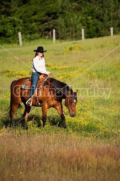 Young woman trail riding in Ontario Canada