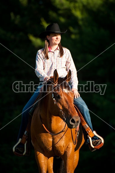 Young woman trail riding in Ontario Canada