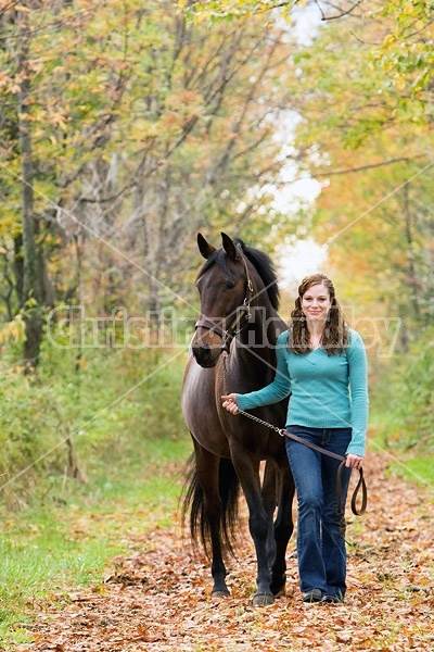 Young girl with horse