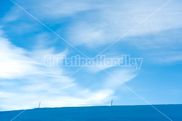 Barn roof with blue sky
