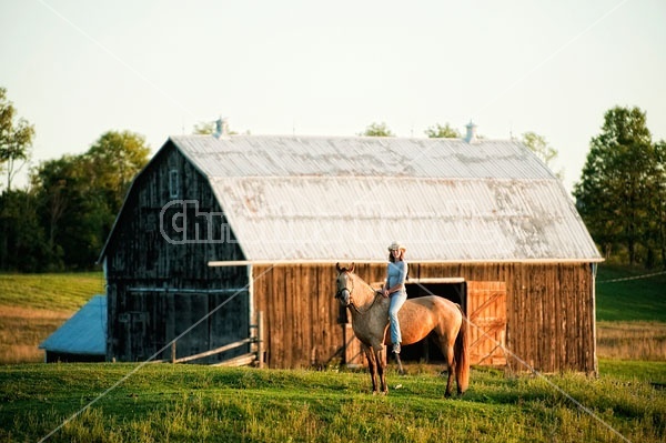 Teenage girl riding bareback