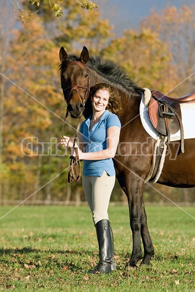 Young woman and her horse