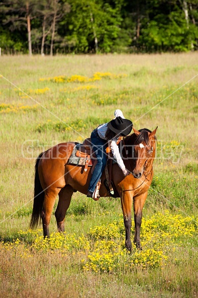 Young woman trail riding in Ontario Canada