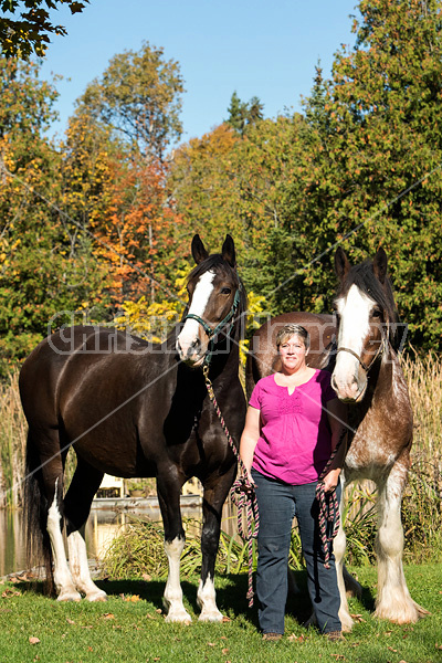 Portrait of a woman and her two horses