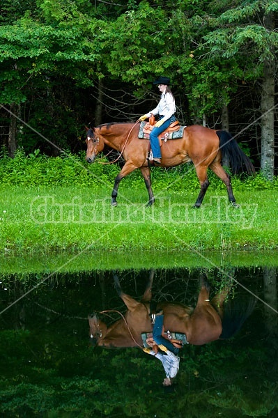 Young woman trail riding in Ontario Canada