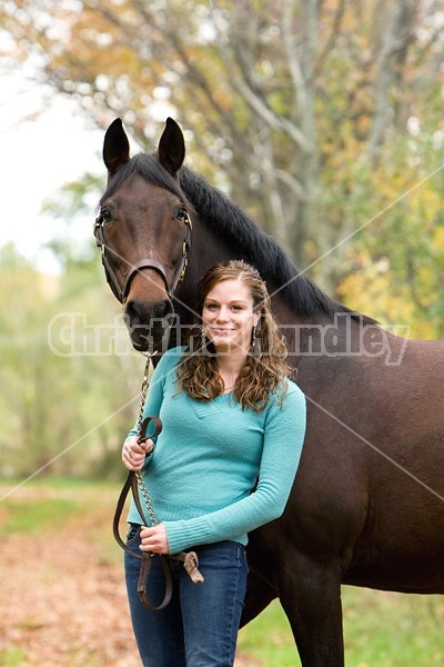 Young girl with horse