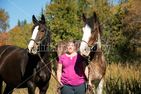 Portrait of a woman and her two horses