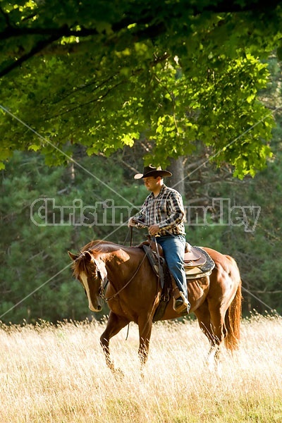 Husband and Wife Trail Riding Together