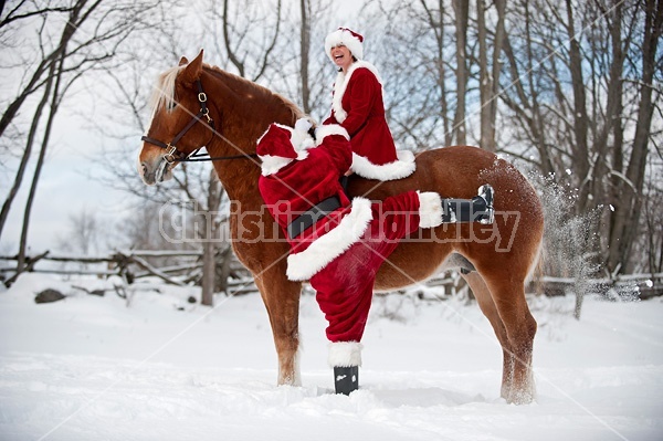 Santa Claus and Mrs. Claus horseback riding