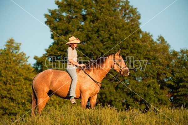 Teenage girl riding bareback