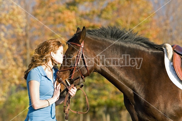 Young woman and her horse