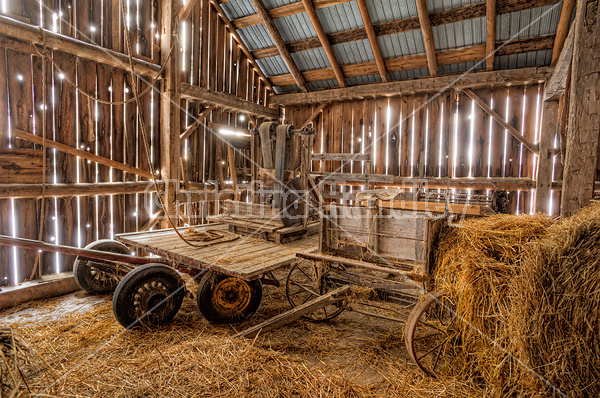 Old wagons in hayloft of old style barn