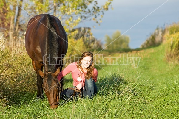 Young woman and her horse