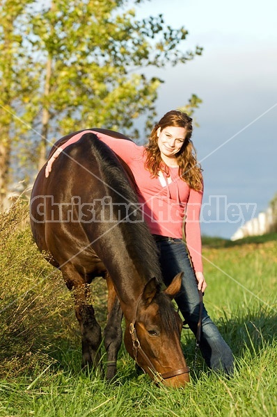 Young woman and her horse