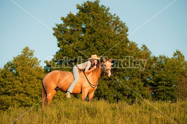 Teenage girl riding bareback