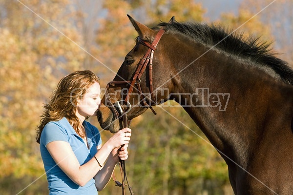 Young woman and her horse