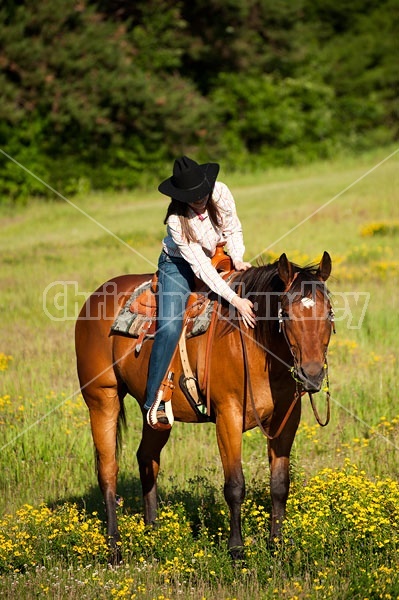 Young woman trail riding in Ontario Canada