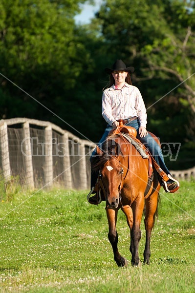 Young woman trail riding in Ontario Canada