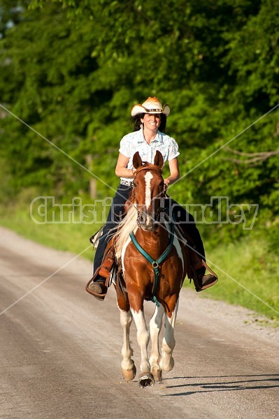 Woman riding Spotted Saddle Horse