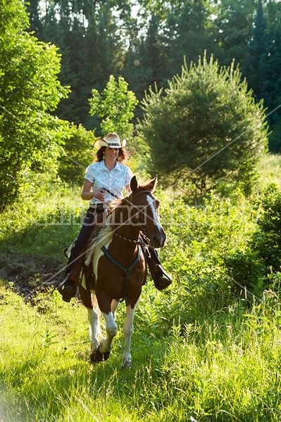 Woman riding Spotted Saddle Horse