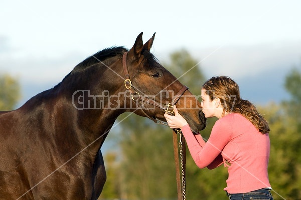 Young woman and her horse