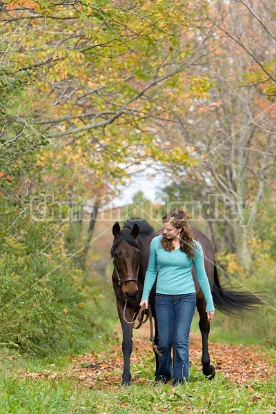 Young girl with horse