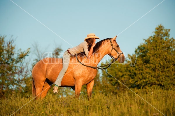 Teenage girl riding bareback