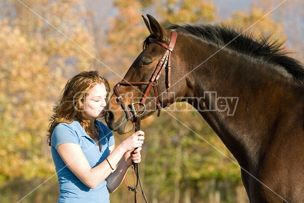 Young woman and her horse