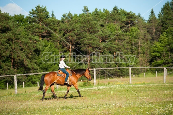 Young woman trail riding in Ontario Canada