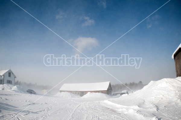 Blowing snow around farm yard