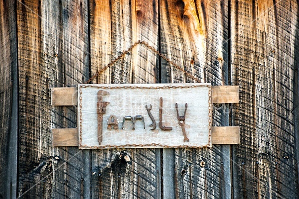 Hand crafted garden art sign made with recycyled and repurposed tools and old farm machinery parts