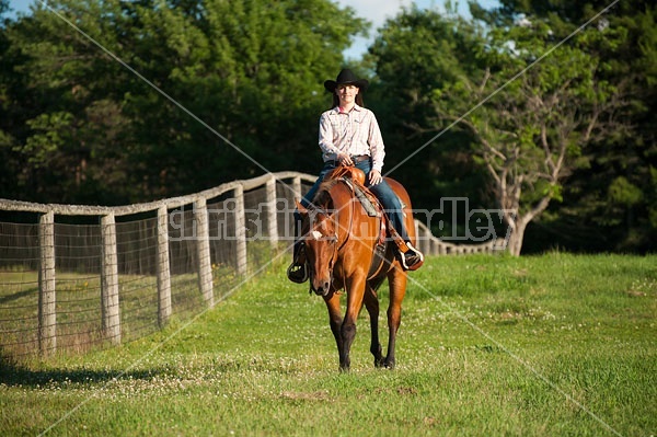 Young woman trail riding in Ontario Canada