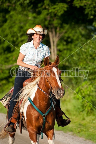 Woman riding Spotted Saddle Horse