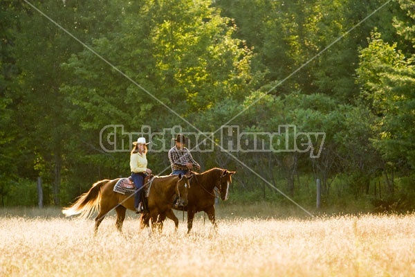 Husband and Wife Trail Riding Together