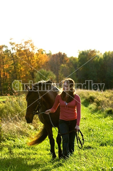 Young woman and her horse