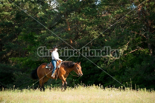 Young woman trail riding in Ontario Canada