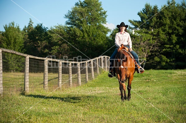 Young woman trail riding in Ontario Canada