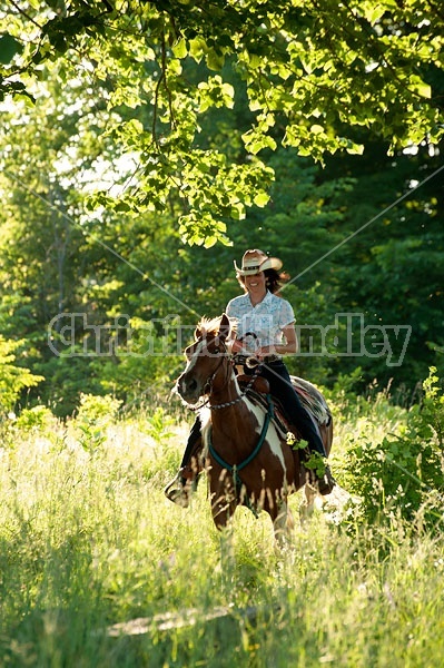 Woman riding Spotted Saddle Horse