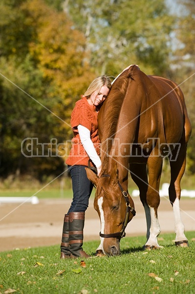 Young woman with her horse