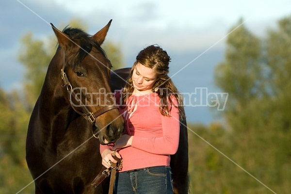 Young woman and her horse