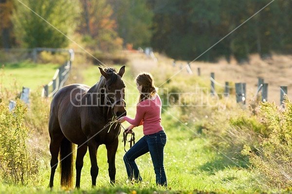 Young woman and her horse