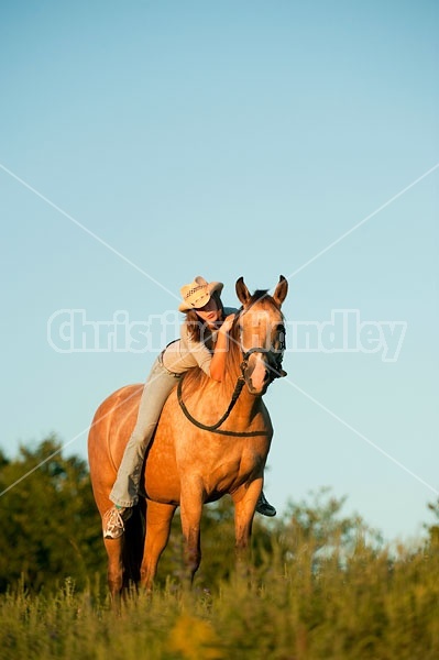 Teenage girl riding bareback