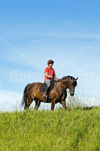 Woman horseback riding