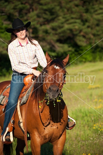 Young woman trail riding in Ontario Canada