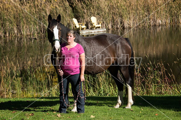 Portrait of a woman with her horse