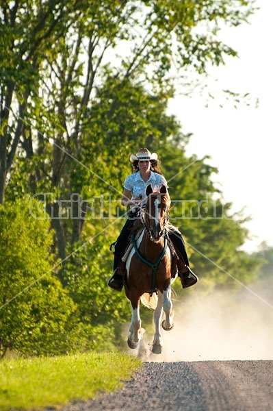 Woman riding Spotted Saddle Horse