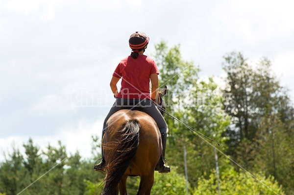 Woman horseback riding