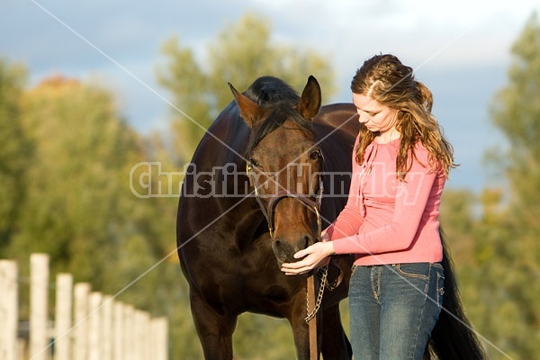 Young woman and her horse