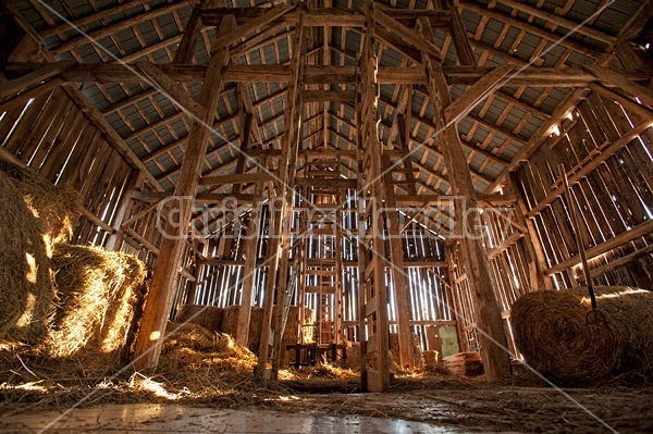 Wide angle view of the inside of an old barns hayloft