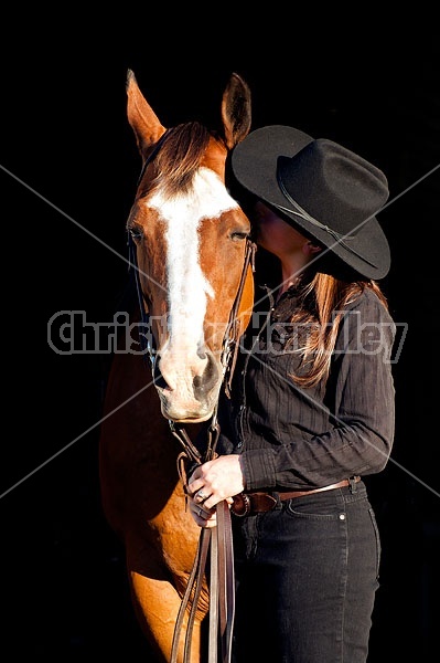 Portrait of a young woman and her American Paint Horse mare
